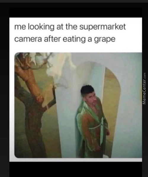 Me Looking At The Supermarket
Camera After Eating A Grape
