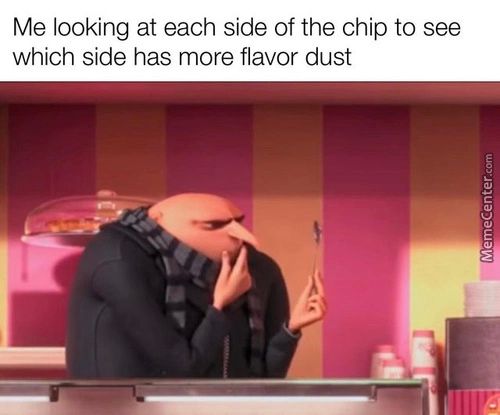 Me Looking At Each Side Of The Chip To See
Which Side Has More Flavor Dust
